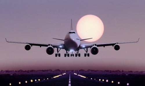 bigstock-Airplane-Touch-Down-During-Sun-103855154.jpg