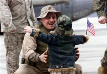 American GI Dad coming home to little boy