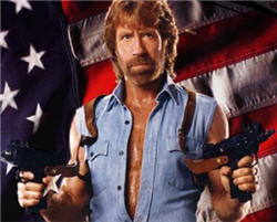 chuck-norris-american-flag-guns.jpg